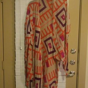 Over shoulder tri sling shrug